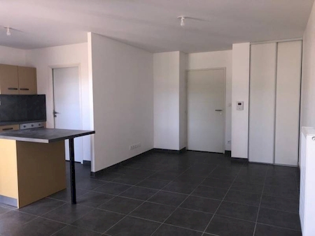 T3 NEUF  EN REZ DE JARDIN DANS RESIDENCE SECURISEE A SABLONS