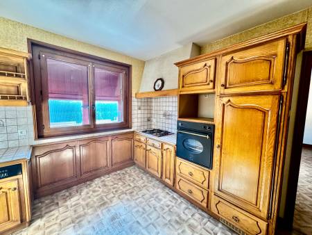 Maison sur sous sol avec garage double et terrain